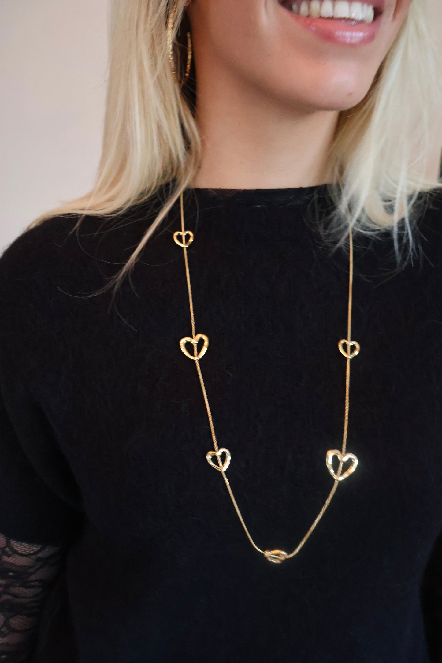 Lange open hartenketting - goud